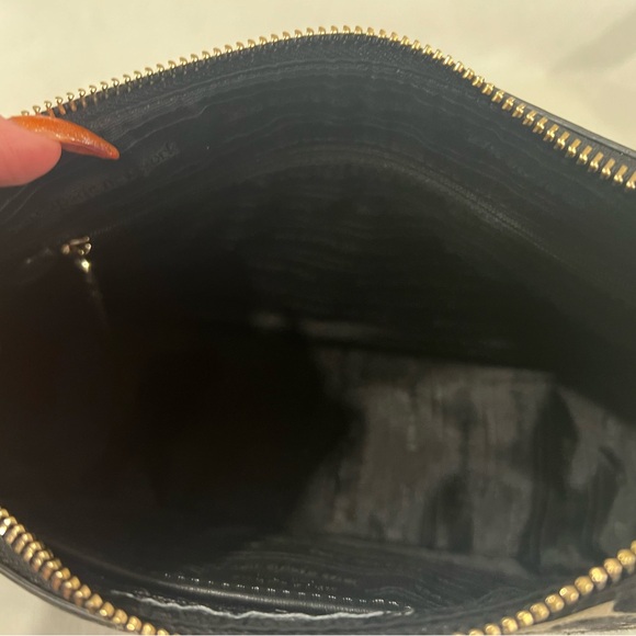 Kate Spade meets Disney’s Mickey & Minnie Mouse on this adorable little bag. - Picture 9 of 12